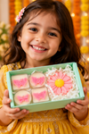 05_child_holding_candle_gift