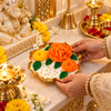 Floral-Diya-Offering-at-the-Shrine